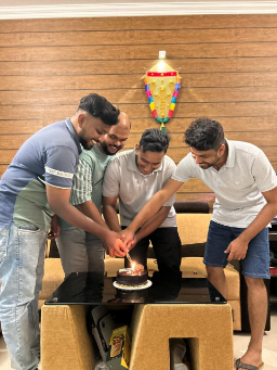 Cutting cake at informal celebration
